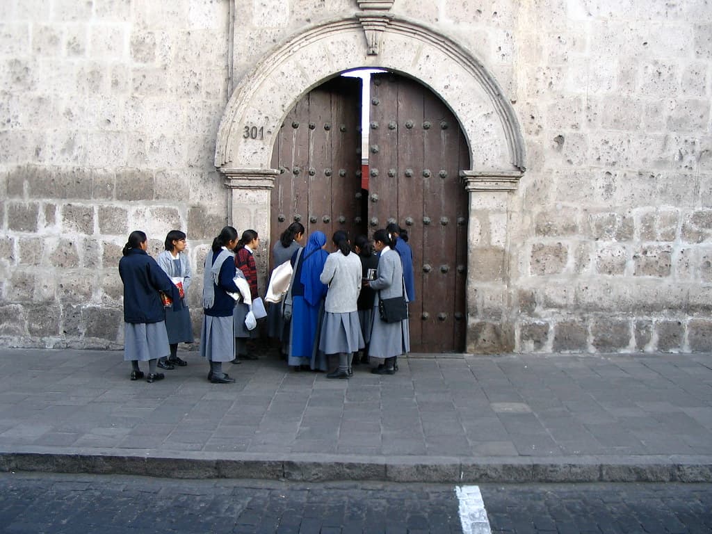 Children prepare to be fed to the Nuns